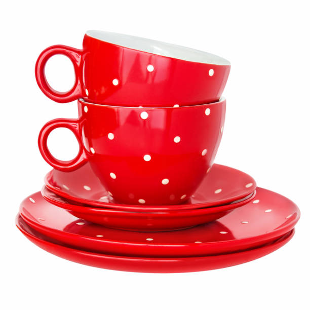 istock Set of dishes two red cups and plates 1203582639