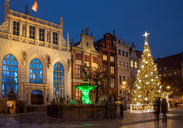 Gdansk, Poland, old town, Statue of Neptune, symbol of Gdansk, with Artus Court in the back. Gdansk, Poland, old town, Statue of Neptune, symbol of Gdansk, with Artus Court in the back. historic heritage square phoenix stock pictures, royalty-free photos & images