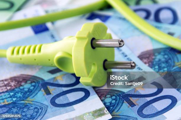 Electricity Savings And Euro Banknotes Stock Photo - Download Image Now - Price, Fuel and Power Generation, Electricity