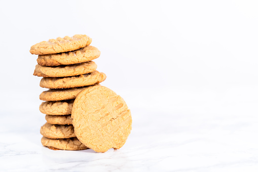 Stack of home made freshly baked peanut butter cookies.