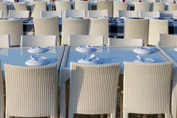 istock Rows of tables in a street restaurant. 1203587590