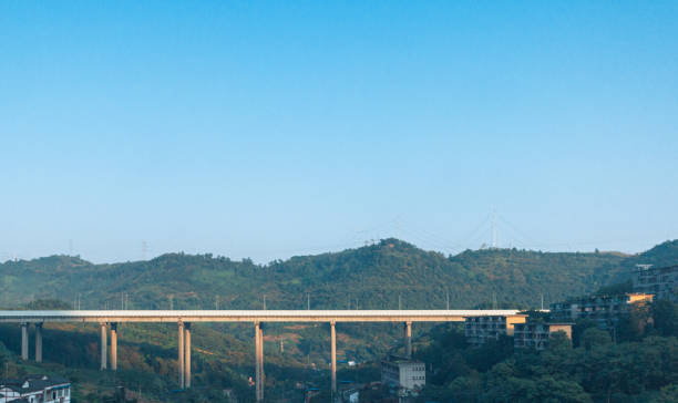 istock viaduct.  Railway bridge between two mountains.  Railway viaduct.  Sky and mountains.  Beautiful natural scenery 1203587705