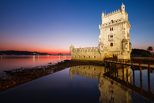 View of the Belem Tower in Lisbon, Portugal just after the sun has set. It was classified as a World Heritage Site in 1983 by UNESCO.