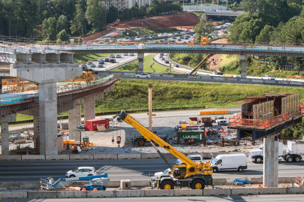 Atlanta, GA, USA - July 22, 2019:  Wide shot of bridge overpasses under construction at the intersection of GA 400 and I-285 on July 22, 2019 in Atlanta, GA.