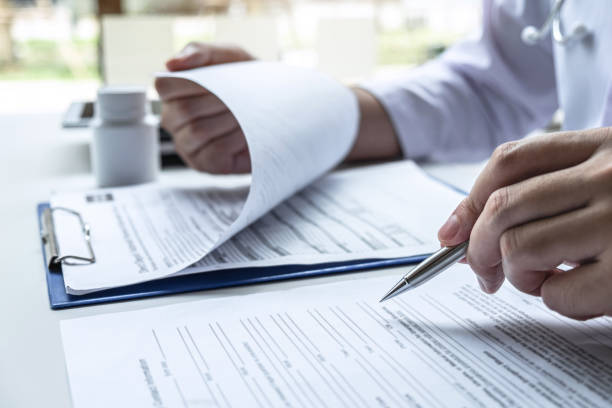istock Doctor having conversation with patient while discussing explaining symptoms or counsel diagnosis health and consult treatment of disease, healthcare and assistance concept 1203591322