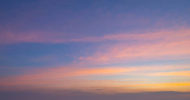 istock Sunset sky. Abstract nature background. Dramatic blue and orange, colorful clouds at twilight time. 1203591559