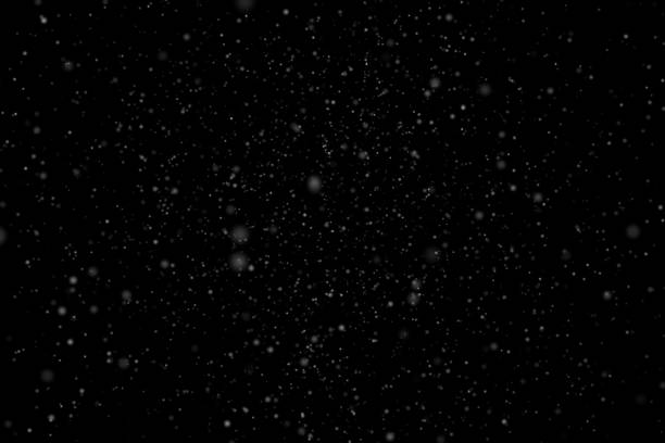 istock Snow or snowflake storm falling. White dots falling powder glitter confetti. Explosion on black background for overlay, abstract illustration 1203591621