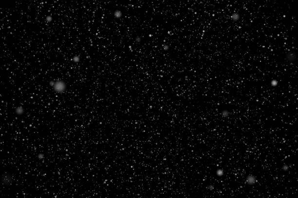 istock Snow or snowflake storm falling. White dots falling powder glitter confetti. Explosion on black background for overlay, abstract illustration 1203592202