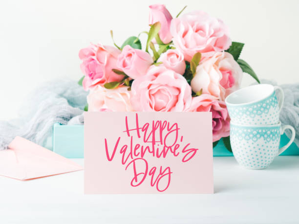 istock Happy Valentine's day greetings on pink card 1203592231