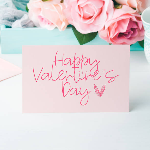 istock Happy Valentine's day greetings on pink card 1203592253