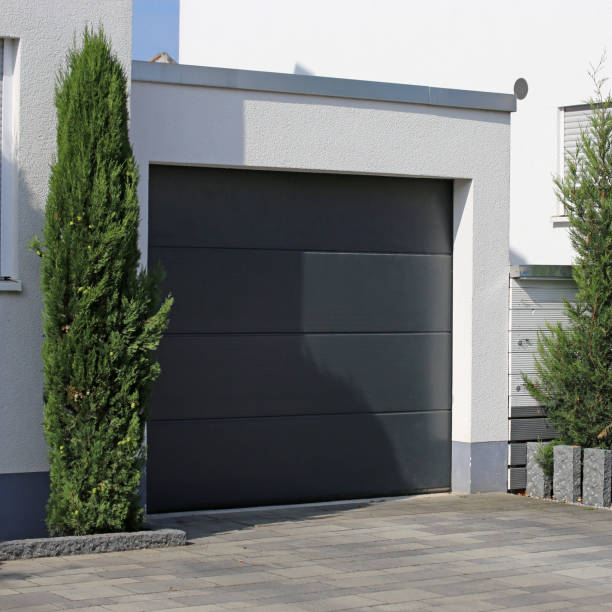 istock Modern new garage door (sectional door) 1203593746