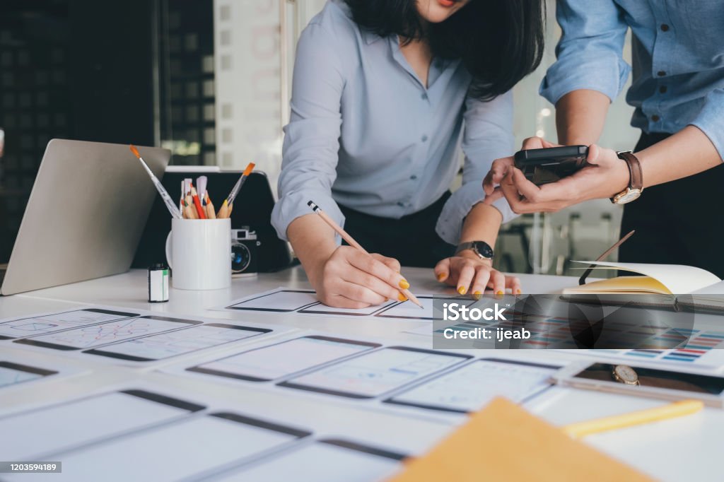 UX UI and Programming development technology. Programmer and UX UI designer working in a software development and coding technologies. Mobile and website design and programing development technology. Coding Stock Photo