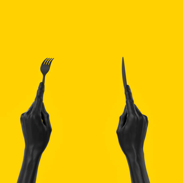 istock Black hands holding fork and knife, top view 3d rendering. Abstract food eating concept banner. 1203594368
