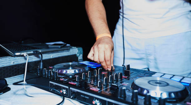 DJ hands realistic on party stock photo
