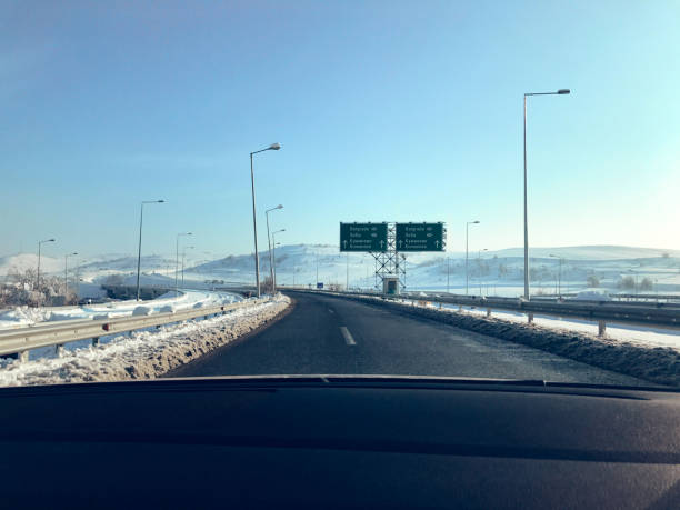 istock Driving on the highway in winter 1203596362