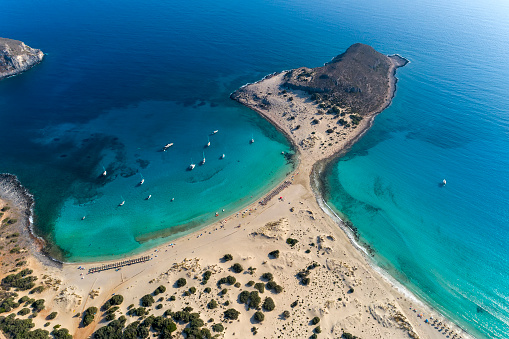 Aerial view of Simos beach in Elafonisos island in Greece. Elafonisos is a small Greek island the Peloponnese with idyllic exotic beaches and crystal clear waters. Laconia, Greece, Europe