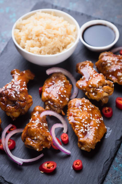 istock Asian spicy chicken wings 1203597461