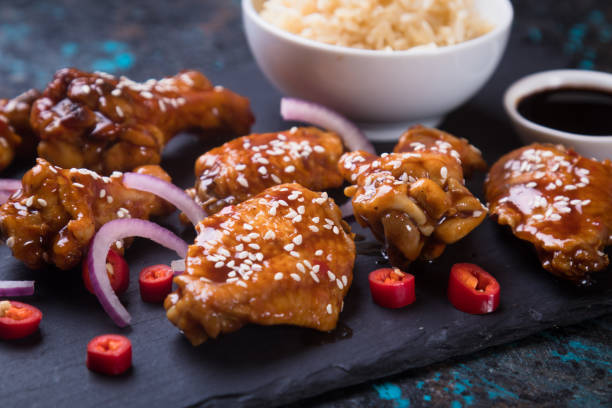 istock Asian spicy chicken wings 1203597494