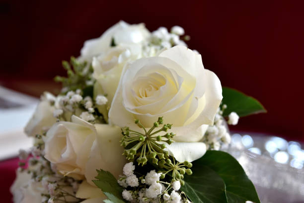 istock beautiful bouquet of delicate white roses 1203597496