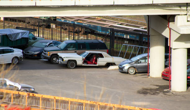 istock old disassembled American car under the bridge 1203597986