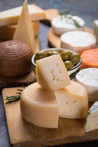 istock Aged cheese round and slices 1203598857