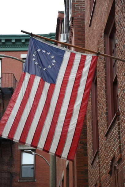 istock Colonial Flag hanging in Boston 1203598951