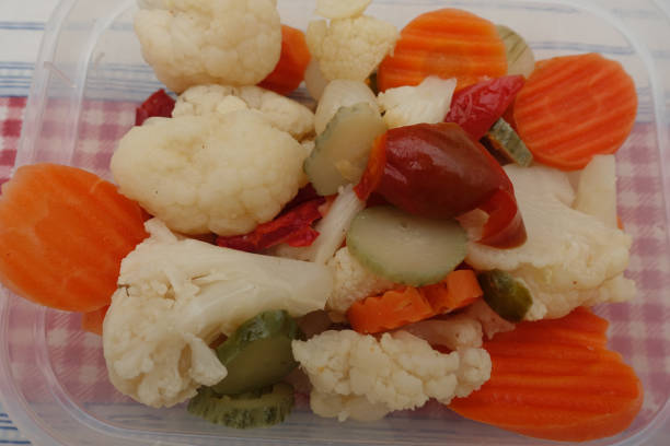 istock Vegetables in vinegar brine  Cauliflower carrot onion red pepper 1203600020