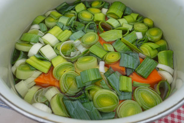 Pumpkin and potato leek soup in a pot ready to cook