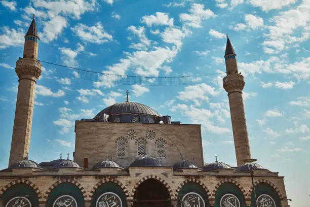 Photo of Mevlana tomb and Selimiye mosque at Konya, Turkey known also as mevlana kulliyesi or mevlana turbesi and Selimiye camii