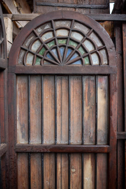 istock Ancient oriental architecture shown on an old antique door 1203601752