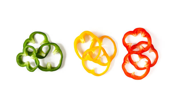 set of colorful sliced bell pepper isolated on white background top view. - green bell pepper green bell pepper organic imagens e fotografias de stock