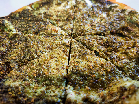 Manakish with cheese and zaatar close up, Levant food