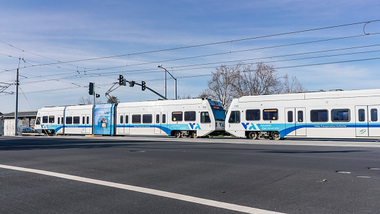 Jan 30, 2020 Santa Clara / CA / USA - VTA Train Not In service crossing an intersection in south San Francisco bay; VTA Light Rail is a system serving San Jose and surrounding cities in Silicon Valley