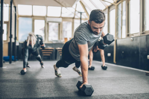 istock Personal Weight Training In The Gym 1203607734