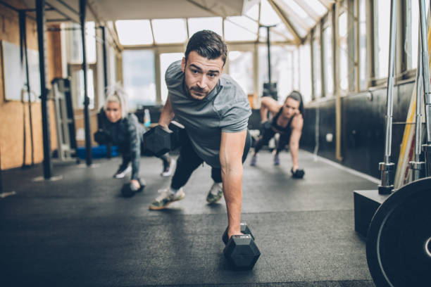 istock Personal Weight Training In The Gym 1203607755