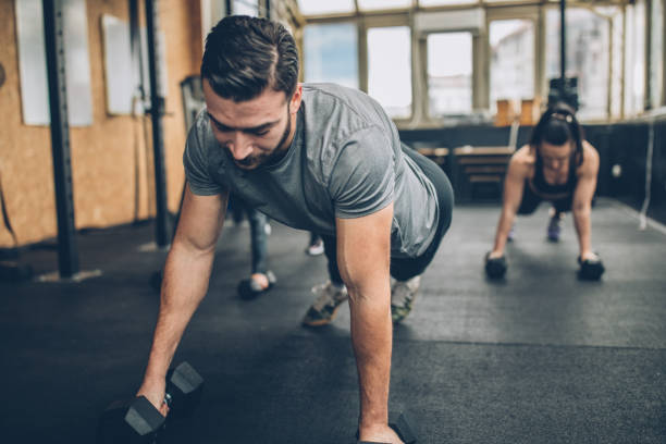 istock Personal Weight Training In The Gym 1203607847