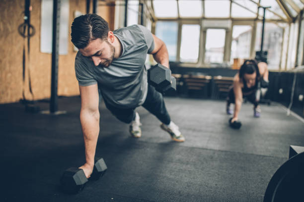 istock Personal Weight Training In The Gym 1203607906