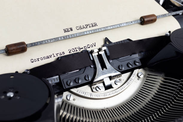 istock Heading New Chapter Coronavirus 2019-cCoV written with typewriter on yellowish paper 1203608017