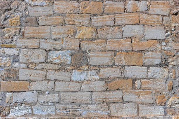 istock Stone wall background close up. Part of fortifications. 1203609670