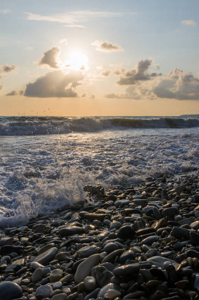 istock Amazing sea sunset, the sun, waves, clouds 1203610403