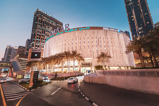27 November 2019, UAE, Dubai: Illuminated Marina Mall Building