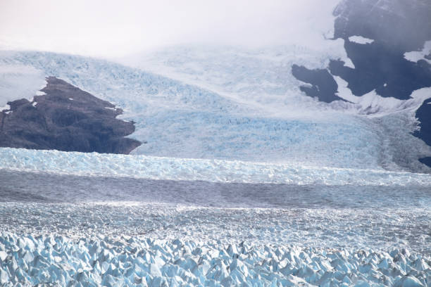 istock The Perito Moreno glacier stretches out in between the mountains 1203613296