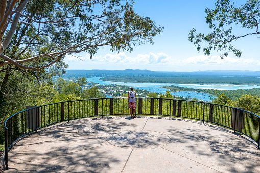 Noosa National Park, Queensland, Australia- February 3rd, 2020; An adult person admiring the view from Laguna Lookout