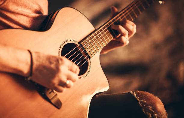 istock Singer with Acoustic Guitar 1203615002
