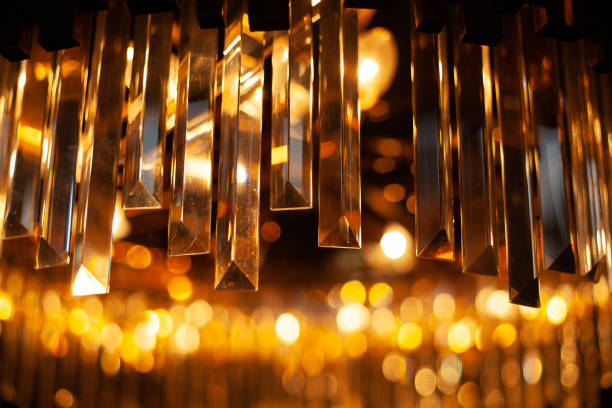 istock Illuminated retro style lamp close up on dark background Close up warm light background 1203617508