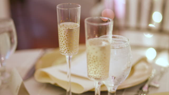 Bride and Groom Champagne Flutes at Wedding Reception