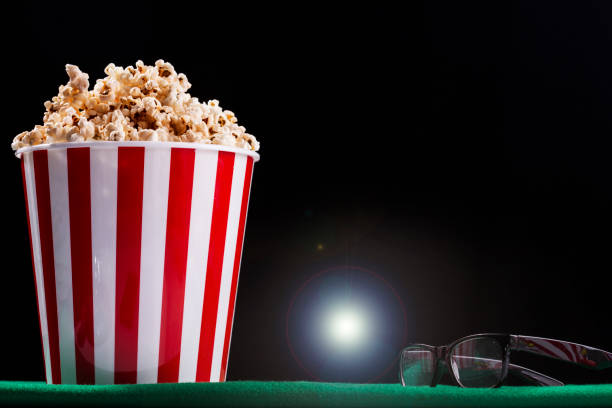 istock Pop corn on armchair cinema 1203620516
