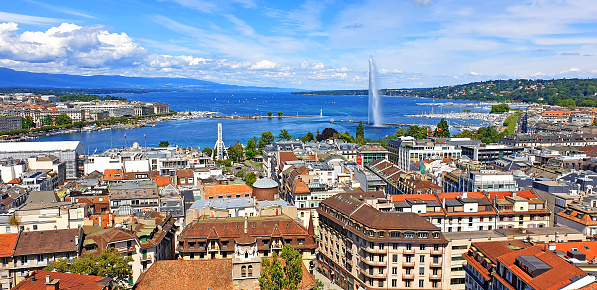 Aerial view of Geneva, Lake Geneva with famous fountain. Photo taken from Geneve Cathedral.