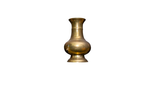 istock A ancient vase made of brass without decorations, isolated on a white background with a clipping path. 1203624967