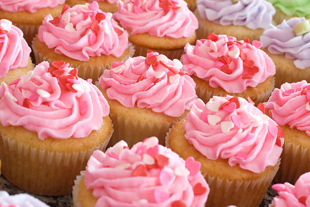 istock Pink Valentine Cupcakes with Sprinkles 120362595